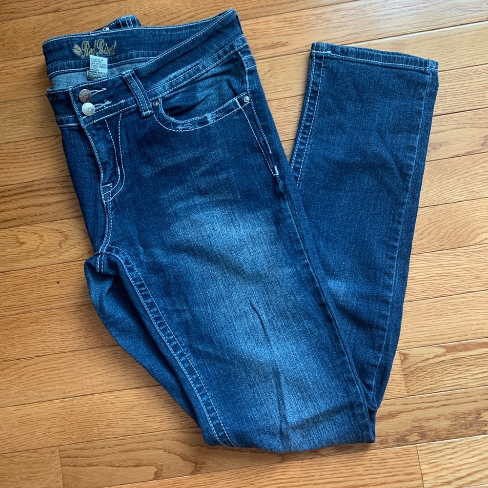 Red Rivet jeans.